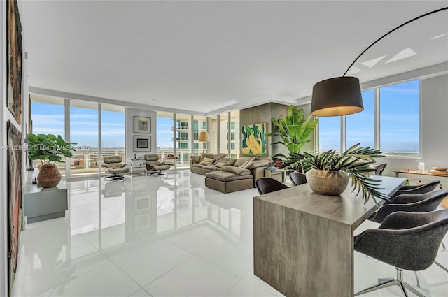 tiled living room featuring expansive windows