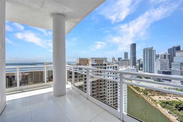 balcony featuring a water view