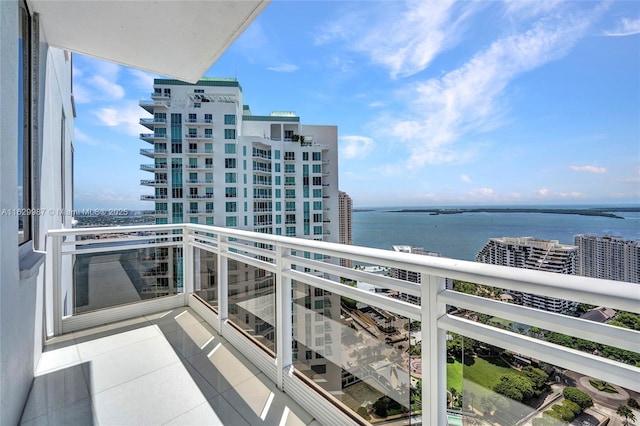 balcony featuring a water view