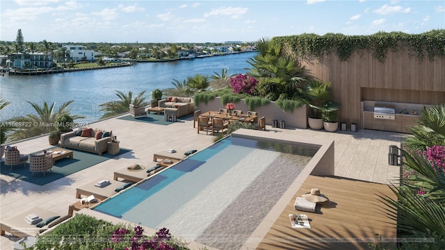 view of swimming pool with a deck with water view and an outdoor hangout area