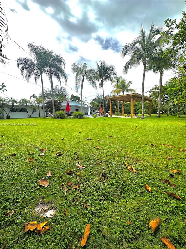 view of property's community featuring a gazebo and a yard