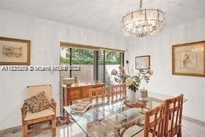 dining room featuring a notable chandelier