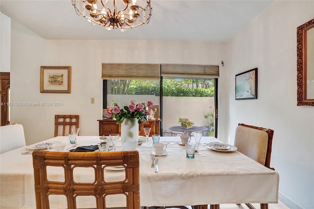 dining room with a notable chandelier