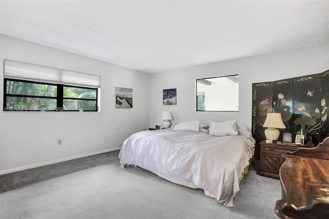 bedroom with light colored carpet