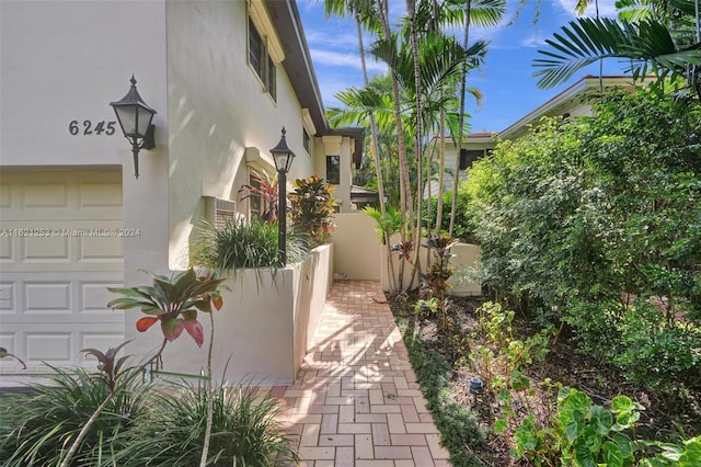 view of property exterior featuring a garage