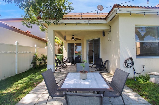 view of patio / terrace featuring ceiling fan