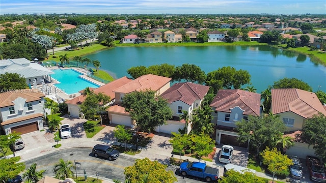 drone / aerial view with a water view