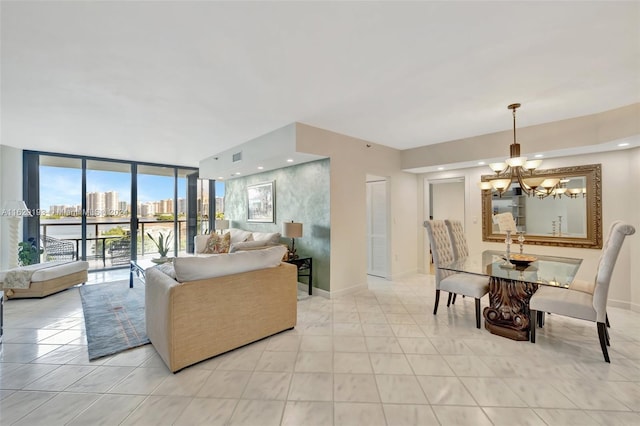 tiled living room with a chandelier and floor to ceiling windows