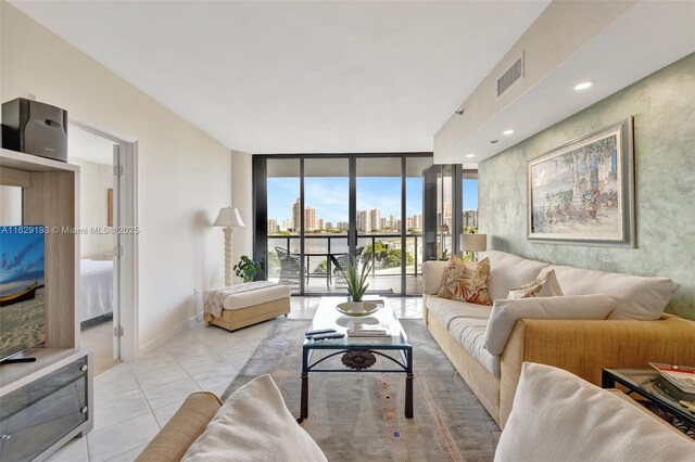 living room with floor to ceiling windows