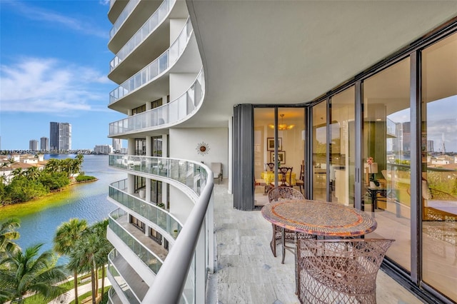 balcony featuring a water view