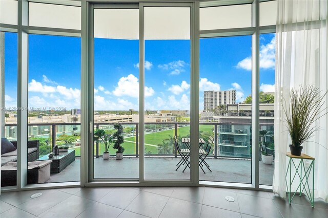 3301 NE 1st Ave Unit M0705, Miami, FL 33137 - doorway to outside featuring a wall of windows and a city view