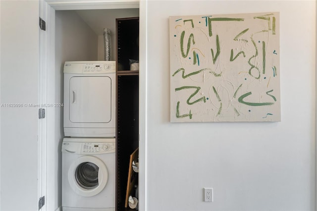 3301 NE 1st Ave Unit M0705, Miami, FL 33137 - laundry room featuring laundry area and stacked washing maching and dryer