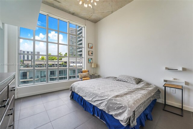 3301 NE 1st Ave Unit M0705, Miami, FL 33137 - tiled bedroom featuring baseboards