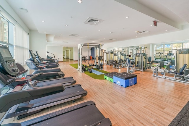 3301 NE 1st Ave Unit M0705, Miami, FL 33137 - gym featuring a healthy amount of sunlight, visible vents, and wood finished floors
