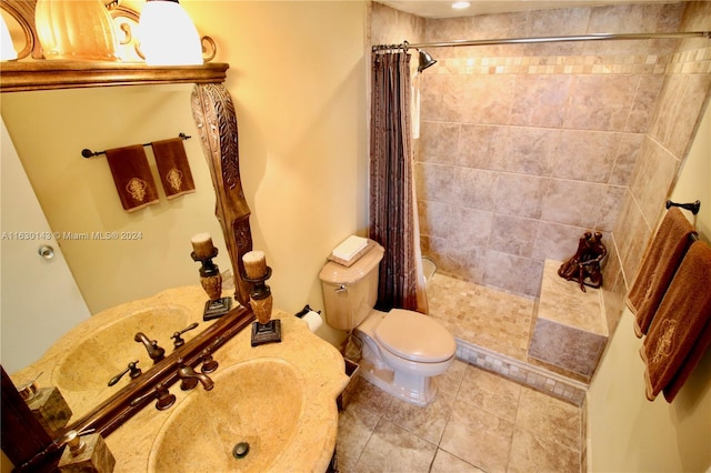 bathroom featuring curtained shower, toilet, and tile patterned flooring