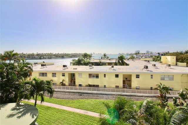 view of property with a water view