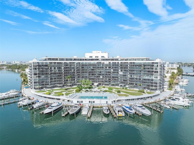 birds eye view of property featuring a water view