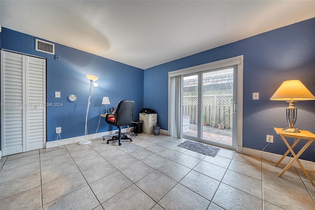 home office featuring tile patterned flooring