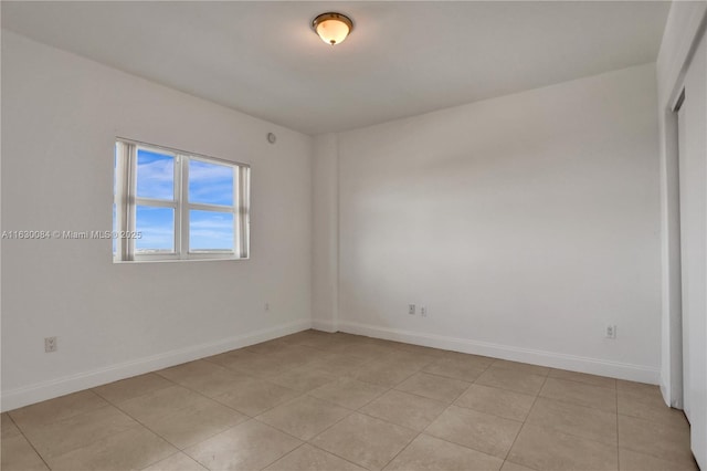 view of tiled spare room