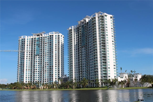 view of building exterior with a water view