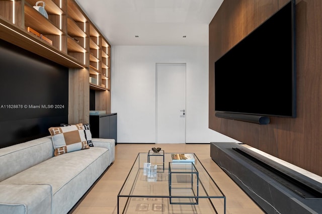 living room with light hardwood / wood-style flooring