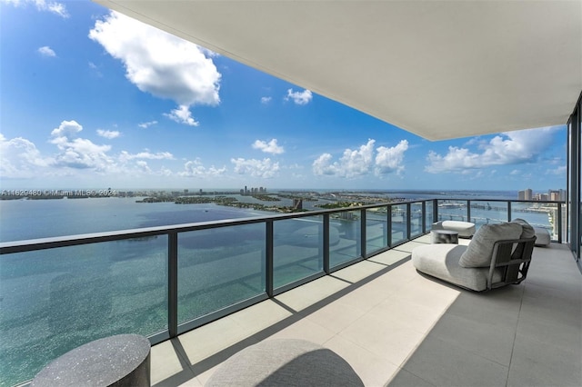 balcony featuring a water view