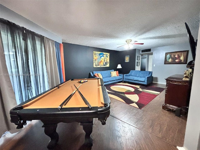 game room featuring pool table, a textured ceiling, ceiling fan, and hardwood / wood-style floors