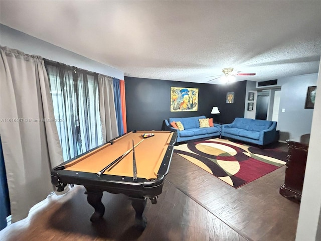 playroom with a textured ceiling, ceiling fan, hardwood / wood-style floors, and billiards