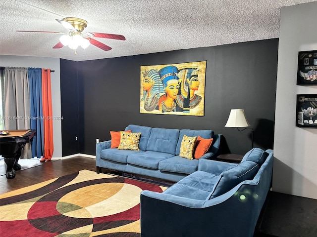 living room featuring pool table, a textured ceiling, ceiling fan, and hardwood / wood-style floors