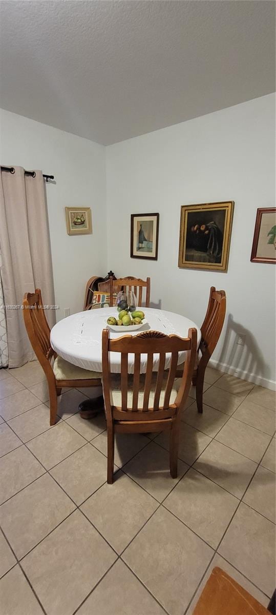 view of tiled dining area