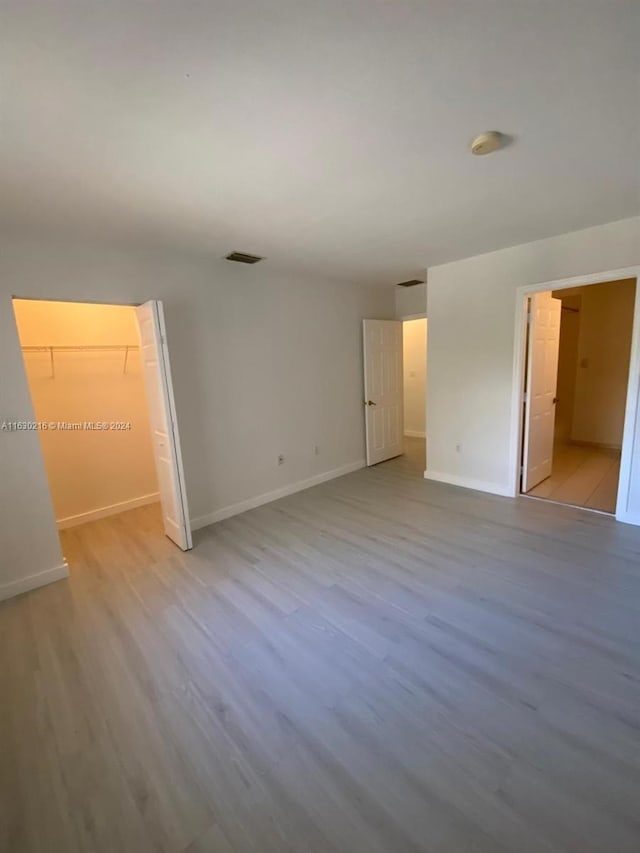 empty room with light wood-type flooring