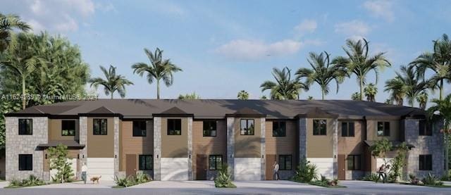 848 SW 1st St, Florida City, FL 33034 - view of building exterior featuring concrete driveway and a garage