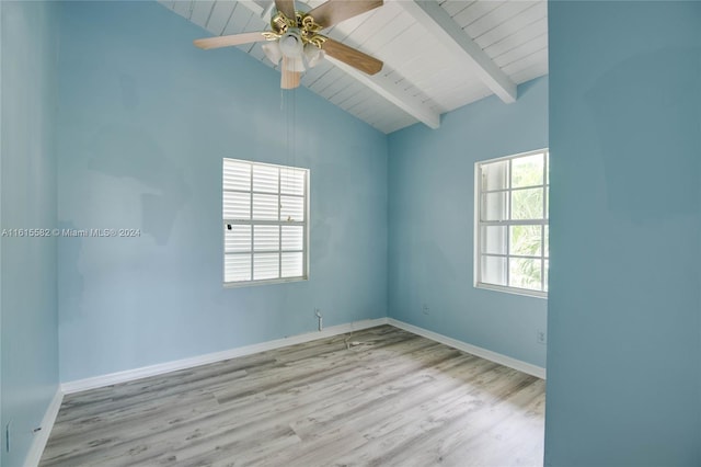 unfurnished room featuring wood ceiling, ceiling fan, light wood-type flooring, and vaulted ceiling with beams