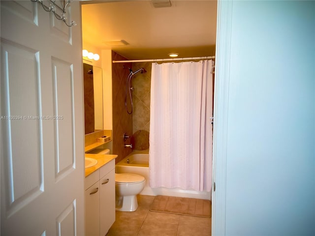 bathroom with tile patterned flooring, toilet, shower / tub combo, visible vents, and vanity