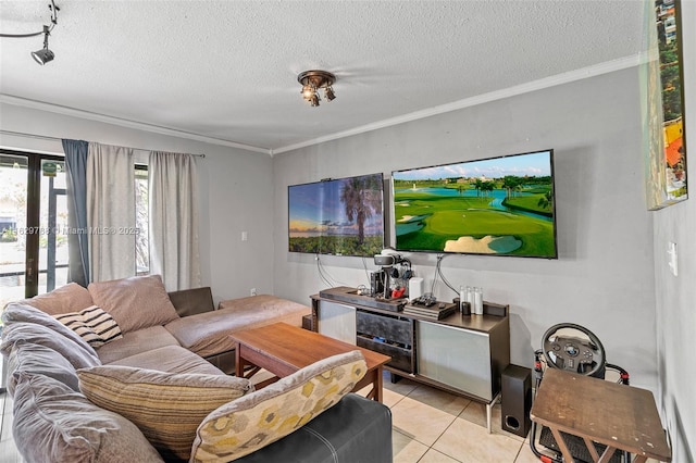 living room with a textured ceiling, ornamental molding, and light tile patterned floors