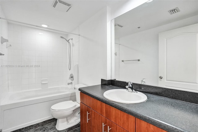 full bathroom with tub / shower combination, toilet, tile patterned flooring, and vanity