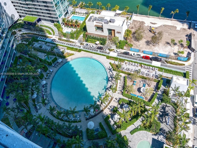 birds eye view of property featuring a water view