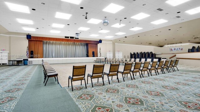 interior space with a towering ceiling