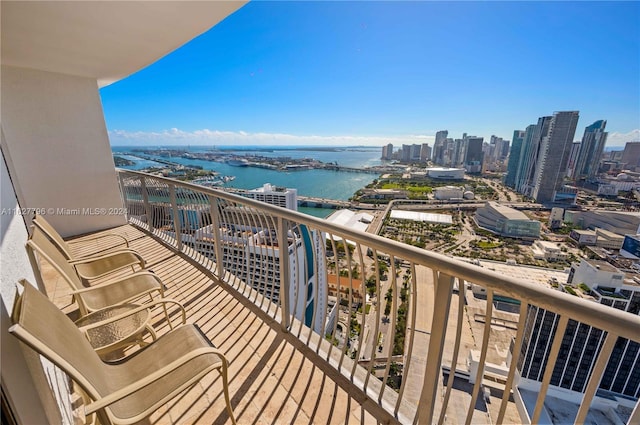 balcony featuring a water view