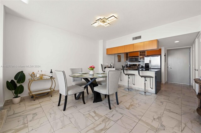 view of tiled dining area