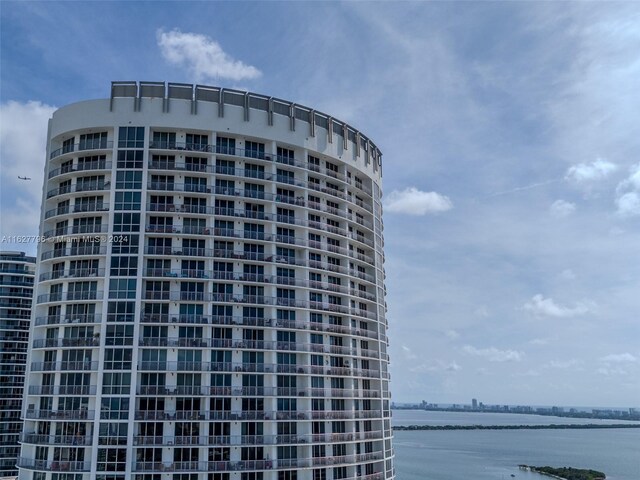 view of property with a water view