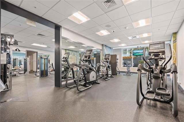 workout area with a drop ceiling