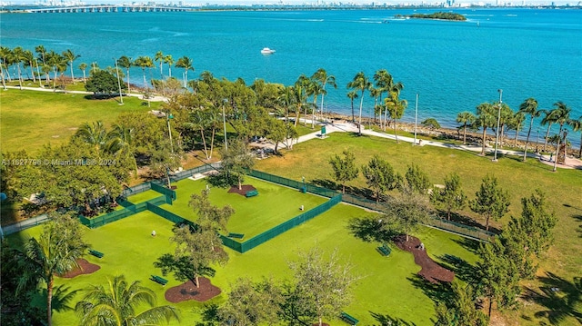 birds eye view of property featuring a water view