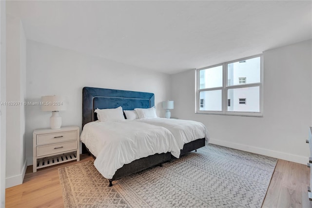 bedroom featuring light hardwood / wood-style floors