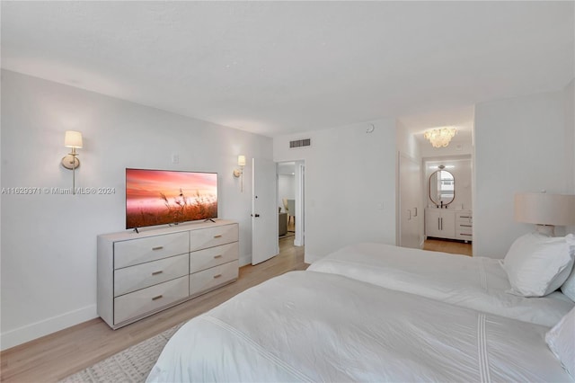 bedroom featuring light hardwood / wood-style floors