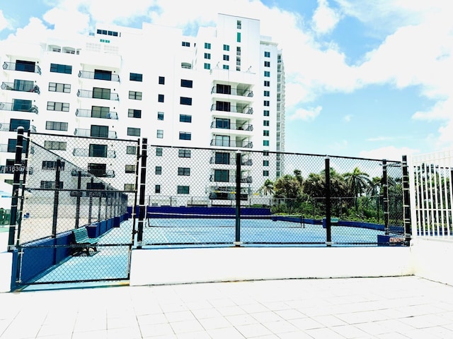 view of sport court with tennis court