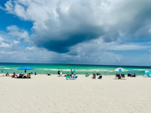 property view of water with a beach view