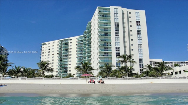 view of building exterior with a water view