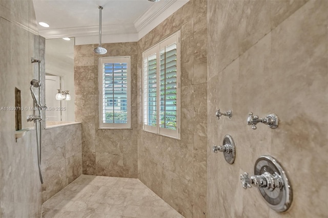 bathroom featuring crown molding and tiled shower