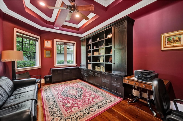 office space featuring coffered ceiling, crown molding, beam ceiling, and dark hardwood / wood-style floors